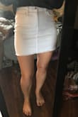 Fits perfectly and hugs your curves without getting too tight. I feel like everything denim skirt I've tried floats away from my thighs (like a triangle) and doesn't look flattering. - Ava L.