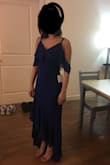 I'm wearing 3 inch heels, but the dress still drags for about an inch at the bottom. So, XS is not ideal for petite girls like myself. - Sachi B.