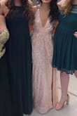 The pink color was stunning and the dress was super comfy. Love the slit and adjustable straps. It is pretty long. I hemmed the outer layer 3 or 4 inches and am wearing 3 inch heels. - Megan P.