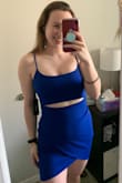 I bought this for my 21st birthday, and it was so cute! The cut-out is my favorite part, and the color is really stunning, too. It rode up a little so I was pulling it down a bit all night, but it looked great. The straps aren't adjustable so they dug in a little bit, but the material is soft and thick enough that it's not see through which was a plus. I got a ton of compliments, and I can't wait to wear it again! - Caroline G.