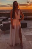 I absolutely loved this dress!! It fits true to size and the slit is such a great addition to the dress. - Maddie D.
