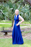 I ordered this dress for prom and from the reviews I ordered a size up and it fit perfectly so I would recommend going one size up. The material was great and so was the quality. I would recommend this dress. - Mackenzie S.