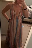 I ordered this for my trip to Spain and I can't wait to wear it. It's very light weight and comfy. It's a little long for me and I'm 5'5 but with cute wedges it'll be perfect. Only annoying part is the straps have to be tied so putting it on took a while, but I love it and 100% recommend. - Michelle C.