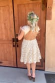 I loved this dress for my bridal shower! It was a little long for my taste (just to my shins), so I had it altered to sit just at my knees. It was perfect, fit so well, and was super comfortable. The v is a little deeper than I expected, but it was stunning! - Allison P.