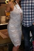 I purchased this dress for my bridal shower. I got so many compliments on it! It fit perfect everywhere but was a little big on the waist. The material was great quality and had some stretch to it. I will definitely wear this again, maybe on the honeymoon. - Crystal K.