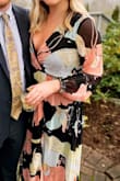 I wore this to a wedding, and I LOVED IT. I received compliments all night- and I felt great in it. The waist has elastic, so it's very comfortable and not too tight. I loved the sleeves- they are nice and flowy and look really elegant. 

The print is beautiful as well- the colors are pretty pastels that really stand out. I will definitely wear this again. - Lydia F.