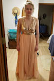 I think this would have looked better on a taller woman. Didn't like the cut or the color, more peach then rose gold. Needs to be on someone with a long thin torso. BUT, the quality was amazing and the fabric was so soft and elegant. - Anna M.