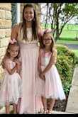 I felt very beautiful in this dress! It was tight around the waist on me, so it fit differently than the tall, slender model of course. It was still gorgeous. I had to get it altered because we were wearing flats in the wedding. They had to take about 2.5-3 inches off the bottom. - Lindsey W.