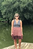This dress is so cute. I usually pin the front a little bit so it's not as much of a dip, but either way this dress is great! It's also a great length on me, not too short which is sometimes tricky. Definitely recommend! - Alanna S.