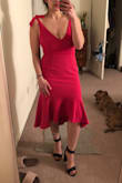Love the dress, it is a smidge large and long for those of us that are on the shorter end but nothing that can't be fixed with heels. Definitely happy with my purchase! Color is true to what you see online. Bra friendly but also can be worn without. - America G.