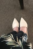 I bought these flats to wear to work and I think they're super cute and fit well, my only complaint is the top of them. Where the top of the shoe hits your foot is kind of stiff so it's a little uncomfortable. All in all good shoe for the price. - Caitlin P.