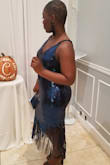 Great dress I ordered a medium. I love that it had some stretch to it. I wore it to a gala I received a lot of compliments. It was a little loose on top because I have bigger hips. - Kettia S.