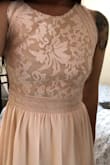 The material is definitely good quality. I am happy with the way it fits - I was worried I wasn't going to fit the small because I am in between sizes. I bought this as a bridesmaid dress - I feel the pink looks more like a nude pink than blush pink. There is also enough material in the bottom that you can alter for any height or heel height. It was a reasonable price - but didn't expect the duty fees (from Canada). Will order again regardless. - Charlotte S.