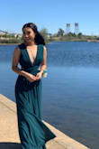 This dress looks absolutely beautiful. The material is soft and has a nice touch to the skin. I love the color and the style! - Kayla N.