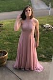 I loved this dress and the color. I was getting this as a bridesmaid dress for my friend's wedding, and we both felt the lace on the back looked weird in person. Returned. - Jennifer F.
