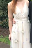 I wore this to prom and felt beautiful! I got so many compliments. It comes pretty much exactly as pictured. I sewed in a little fabric to the top to make sure it didn't come open too much when I danced (that probably wouldn't be necessary at all for someone bigger-chested). The adjustable straps were so nice, too. Overall, great dress! - Kaylee W.