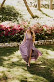 We ordered this dress for one of my daughter's outfits for her senior photos. We couldn't be happier with this beautiful dress! She loved it, and it photographed beautifully. It was a tad loose in the chest, but we used two-sided tape, and it worked great. - Claudia W.