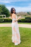 Wore this for my bridal shower and received compliments from every guest. The dress is so beautiful and airy and is such a soft, chiffon-y material you just want to twirl around in it. It's slightly see through, so just be careful with undergarments. - Carina C.