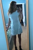 I ordered this as a graduation dress, and it fits very well. I ordered a XS when I was debating between XS and S, but it fit me very well. Very flattering! - Sarah D.