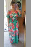 Overall fun and pretty dress. I have a true hourglass figure and I would only call this "semi-flattering" on my body type. It does look a bit like a muumuu me and it definitely hugs my bust. I have received a ton of compliments but if I had been able to try it on BEFORE making the purchase I'm not 100% sure I would have bought it. The fabric and print are lovely. I ordered a medium and the fit is great, but I need to have it hemmed like 6 inches even in my heels!!! - Amy G.