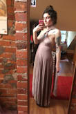 I was skeptical about getting a small or xsmall but glad I got the xs, it's quite heavy but a very soft material. There's tons of ways to wear this dress, I got it as a bridesmaid for a wedding this summer, and looking forward to wearing it. I may get a slit added on the side, but for now it's cute. Would definitely order a size smaller! - Sarah K.