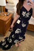 So, just like many other reviews say, this dress is amazing... but the ties are very confusing lol. My only comments are that it is too long for my 5'2 frame, but with it being short in the front it isn't so bad! I'm wearing this for a photo shoot so it doesn't exactly need to be practical. Also, I feel it is much darker in person. I almost thought it was black. - Brittany L.