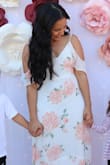 I wore this dress for my bridal shower - it was gorgeous to wear for an outside party under the sun. It was comfortable, the quality is great, and I made the mistake of wearing black Spanx (which was a bit see-through) so I recommend white or tan underneath. Since I'm short, it runs a little long but I wore 3-4 inch heels and it flowed beautifully. Would order from here again! :) - Vida R.