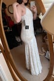 By sizing up, the length became perfect floor level! I ordered a Large also but it was just unflattering. The XL lays over my bottom have beautifully and I plan to probably get the top half just taken in a little. But I think I said Yes to the dress!! Such a great price and beautiful detail with a vintage look! Cannot wait to wear this! - Miraya J.