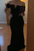 This dress far exceeded my expectations! I ordered small (mediums were sold out) thinking I wanted to just try it... make sure I liked it while I waited for medium restock. But the small was perfect!  It is body hugging but is not distasteful. It stays up on the bust without having to pull at it repeatedly.  It is the perfect length to wear with regular heels. I can't wait to wear (bridesmaid dress!) PS picture from try on only - Angela H.