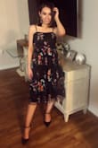 I got many compliments on this dress and absolutely loved it. It fit perfectly and has adjustable straps to accommodate different bust sizes. It feels like great quality material and is a very comfortable dress to wear. - Monica M.