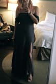 This dress is so flattering and I love the slit. I ended up cutting the elastic out of the off shoulder sleeves because they felt sooo tight. I liked the look even better with the looser 'sleeves' and the dress is constructed to stay up without them. 

Overall really happy with it! - Brynn T.
