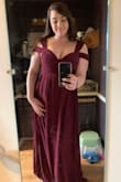 I got this dress previously in the blush color and couldn't get it zipped, so I ordered it in the burgundy and it fits perfectly and looks gorgeous. Is just the right length. My only complaint is the amount of cleavage. - Hailey V.
