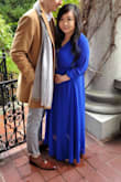 Purchased it for a friend's wedding and got a few compliments. The best part was how comfortable it was! The elastic is sturdy so in hindsight I would have ordered a medium instead. The downside is that the sleeves are wayyyy too long for someone short like me, and it was going to cost way too much to take it in. I ended up tucking it in and it looked fine. I did have to pay to hem the length of the dress, but it was worth it because it sat beautifully. - Angie Y.