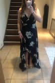 I ordered this dress for a wedding and really loved it! Usually I have an issue wearing wrap dresses as they tend to be too tight in the chest area, but this fit just right! It was a bit long on me which was expected, and I was anticipating getting it altered. I did find the ruffles on the straps to be a little awkward. Unfortunately, I did end up sending back because of the length and the straps, but it is still a gorgeous dress! - Bella M.