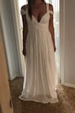 This dress is perfect!!! The material is great quality and it will be perfect for my summer wedding! It's a bit long and the straps are a little bit loose, but it's nothing a tailor can't fix. I absolutely recommend this beautiful dress! - Abigail B.