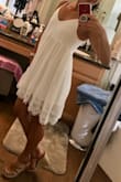 Love this dress and can't wait to wear it this summer! The liner underneath hits about 1-2 inches below my butt, so I'll have to make sure it stays in place when I'm out dancing! - Lisa D.