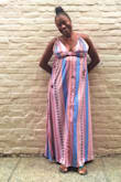 I've not worn this dress yet because I purchased this dress and two others for a vacay to Cuba soon. BUT tried it on as soon as it arrived last week. 

Love. Love. Love. This Dress!!!! 

Had a concern that the front cut would be to low. No worries there. Fabric is uber soft and flows beautifully. I will need to either have the dress hemmed or buy a taller heel. I'm all for buying new sandals to wear with my dress. LOL. This was a great choice for me. - Kimberly H.