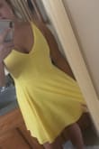 Love this dress so much. Compliments curves well and fits like a dream. Yellow looks great with a tan! Excited to wear it for graduation. Paired with yellow fringe earrings! My daughter was pulling on the dress in the pic sorry - Kerah B.