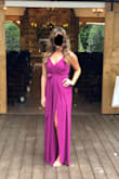 I bought this jumpsuit for a wedding, and once I had the alterations done, not one complaint! I did have to get it hemmed up, even with 4 inch heels it was still pretty long. Then when I zipped the back up the top pulled a little too much for my liking (my waist might be in between sizes, but a medium would have been way too big) so I had my tailor let some of the fabric around the zipper loose and it worked perfectly! The straps are a tight clingy stretchy material that didn't budge one time all night even while dancing. The bust area had me a little worried, as soon as I put it on the girls fit in there perfect! Wasn't a concern at all. Overall, this is my favorite piece in my closet and received so many compliments! - Kaitlyn P.