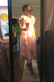 I got it in a sale and I love love the color and the fit. I am going to wear it to friend's wedding and I can't wait. There's considerable cleavage which I am planning to cover up. Sorry the pics are taken in golden light. - Nandana N.