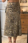 What a great skirt! So happy with the material and the print! Glad I followed the suggestions of other reviewers and ordered a size down. I'm normally a size small and ordered the x-small and it fits perfectly. I'll have to have it shortened to be true midi length on me (short girl problems), but the additional cost is worth it to add this to my wardrobe! - Amber B.