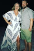 I bought this dress for my sister's wedding rehearsal in Caye Caulker, Belize and got so many compliments! It's nice and airy with the slit and so comfortable! I'm 5'10" and it was the perfect length for me. I chose to size down to a medium and I'm so happy that I did because it fit great! - Shannon C.