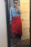 Looks great with a crop top & wraps far enough around that nothing's exposed. 
A great, vibrant red skirt that catches the eye. - Leah O.
