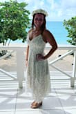 Bought this dress for my symbolic wedding ceremony in Antigua and I loved it! I sized up due to some reviews and I'm glad I did! It fit perfect in the chest, but it felt a little loose in the waist. Wish it fit the same throughout, a little tighter in the waist would have been better. But it worked! And I loved it. - Kasey H.