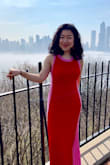 I love this vivid colored dress. I bought the blue color one first, but I liked it so much that I had to buy one in red. I got so many compliments. I'm only 5 feet tall so the dress is more like a maxi dress for me but I wear it with heels so I didn't have to get it fixed. 
The material is knit so it stretches, and it's thick enough not to show underwear lines.  I'm glad that I got these dresses. - Yukiyo M.