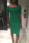 The best thing about this dress is the kelly green color and style. It's not easy to come by and I just love it. The length is great and I love how the off the shoulder look can be adjusted to be not so low and it is sexy. My problem with the dress is that I'm typically a small in practically everything I wear (typically size 4) but I ordered a M based on reviews. This dress is STILL too small..around the hips and butt! It's fine at the top but I have an athletic pear shape and I guess my hip and butt make it such that this rolls up when I walk. It's fine once a pull it down, like I did to take the photos. Also, the material is relatively thick but I still can see the imprint of my thong underneath. My stomach isn't perfectly flat so I can also see my pooch too. One might need Spanks with this. I wouldn't size up cause I'd be afraid that the top would be too loose. I think there will always be limitations when the sizes are XS-XL rather than number sizes, which allows more variation. In addition, it's the type of dress that gets wrinkled, so I had to iron it before wearing. Overall, I love the dress with several asterisks. - Miranda R.