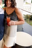 Got this dress for vacation! It's so comfortable and the back is really cute. The straps are adjustable. Got adhesives for the boobs and worked perfectly. The fabric is really soft but wrinkles really, really easily. - Sarah T.