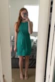 Bought this dress for my college graduation. Fits very well, maybe a little tight across the chest for me. The length was great even with my height. - Megan B.