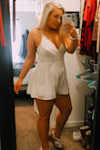 I ordered this romper for high school graduation and it did not disappoint. I have a smaller chest for my size, so the top is larger on me, but I wouldn't size down. The straps are adjustable too. The length is perfect considering I'm 5'2". I got a ton of compliments while wearing this. I didn't have to wear a bra or pasties with this either because the lace is very concealing. Definitely worth buying! - Jadyn M.