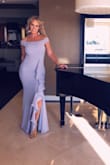 Slightly stretchy so it lays perfectly. Thick material- not see through at all. Insanely classy!! Yet sexy!!! - Jennifer G.